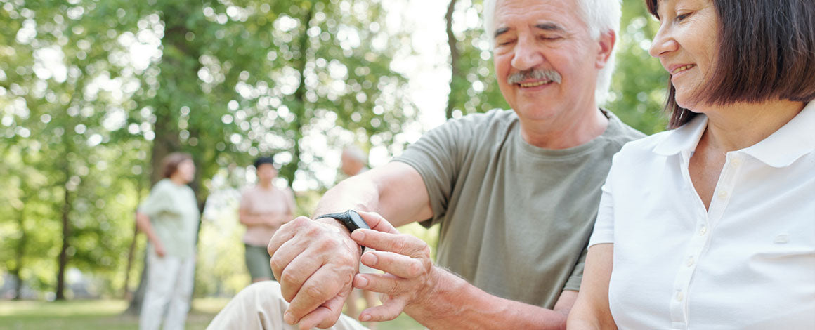 Older couple walking outdoors