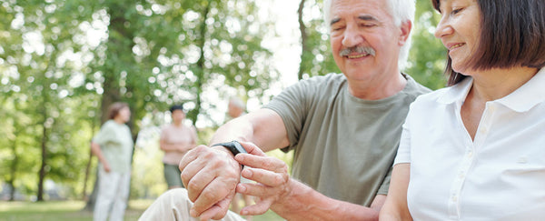 Older couple walking outdoors