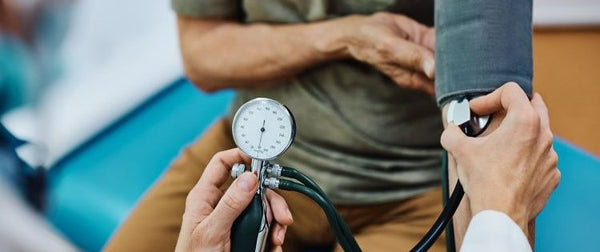 Doctor measuring blood pressure