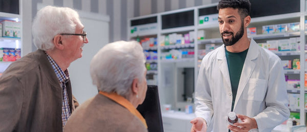Elderly couple at pharmacy