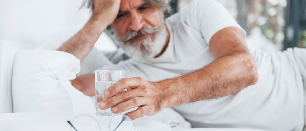 Elderly man feeling dizzy