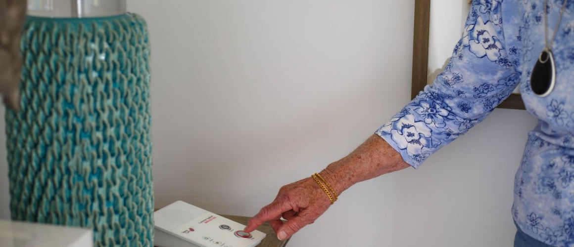 GPS-enabled pendant alarm with a base unit