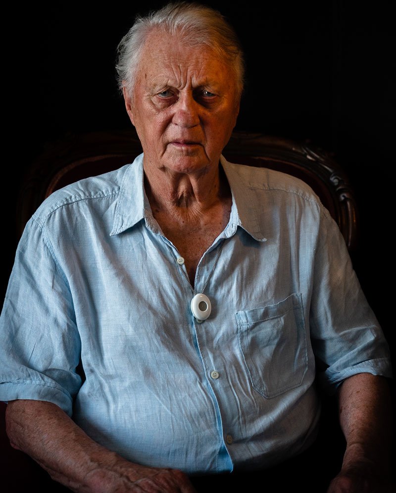 Elderly man sitting alone