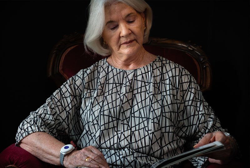 Senior woman sitting alone