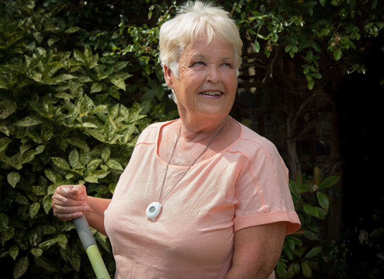 Emergency button worn by elderly person