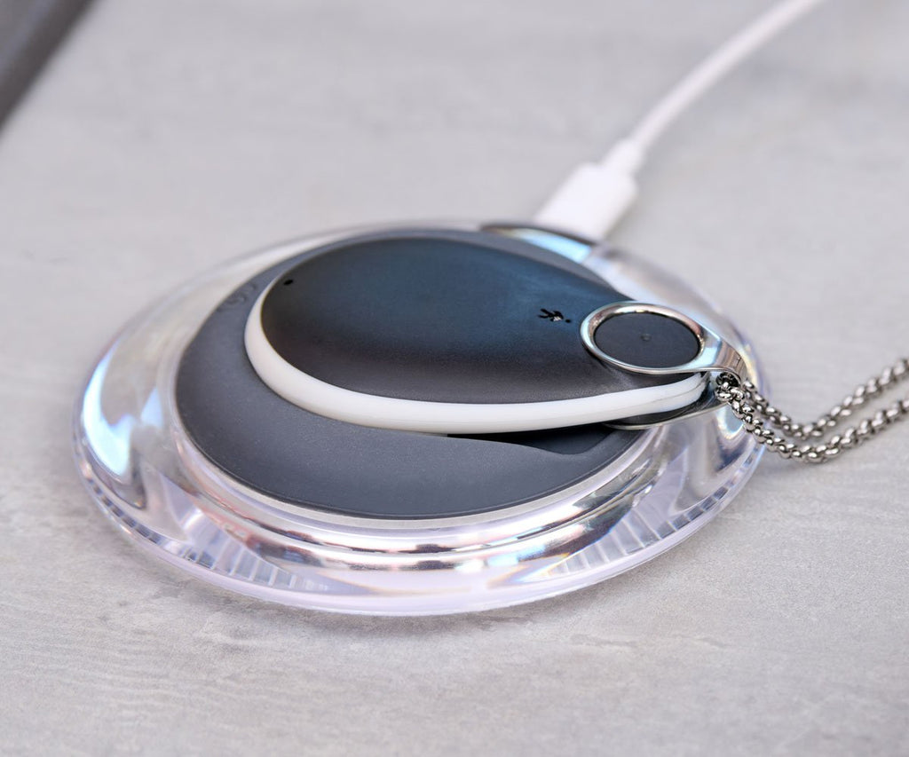 Close up alarm pendant charging