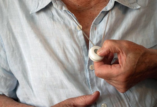 Water resistant single button alarm