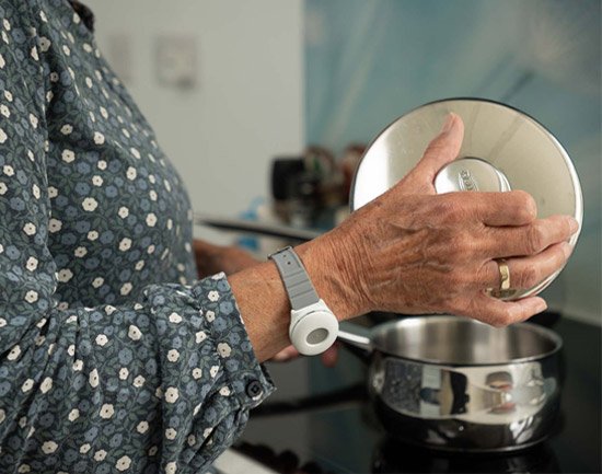 Lady wearing water resistant panic alarm