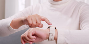 Elderly woman with her Apple watch