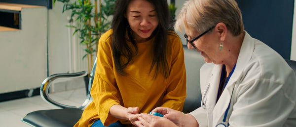 Woman having diabetes test