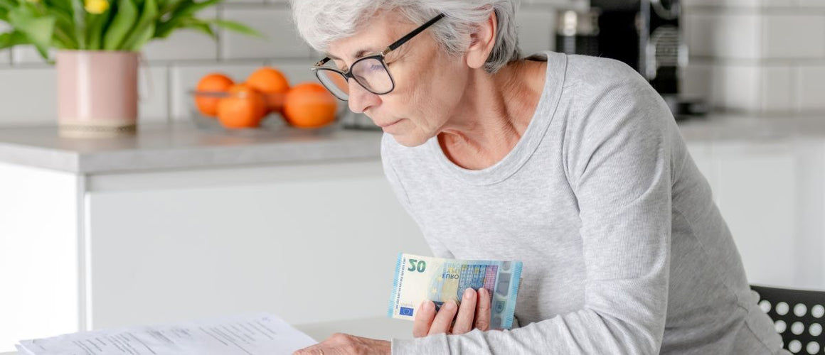 Elderly woman checking her pension credit