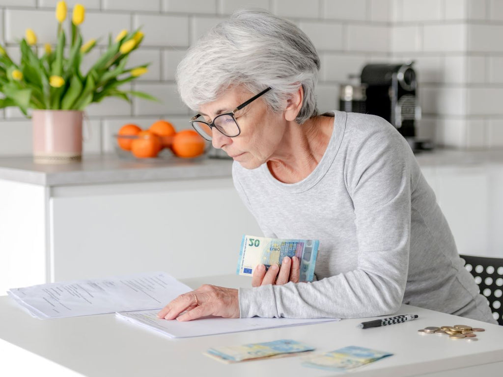 Elderly woman checking her pension credit