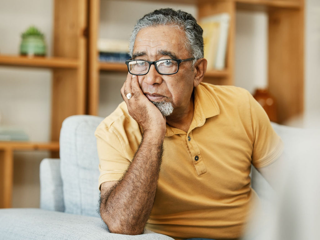 Elderly man feeling stressed