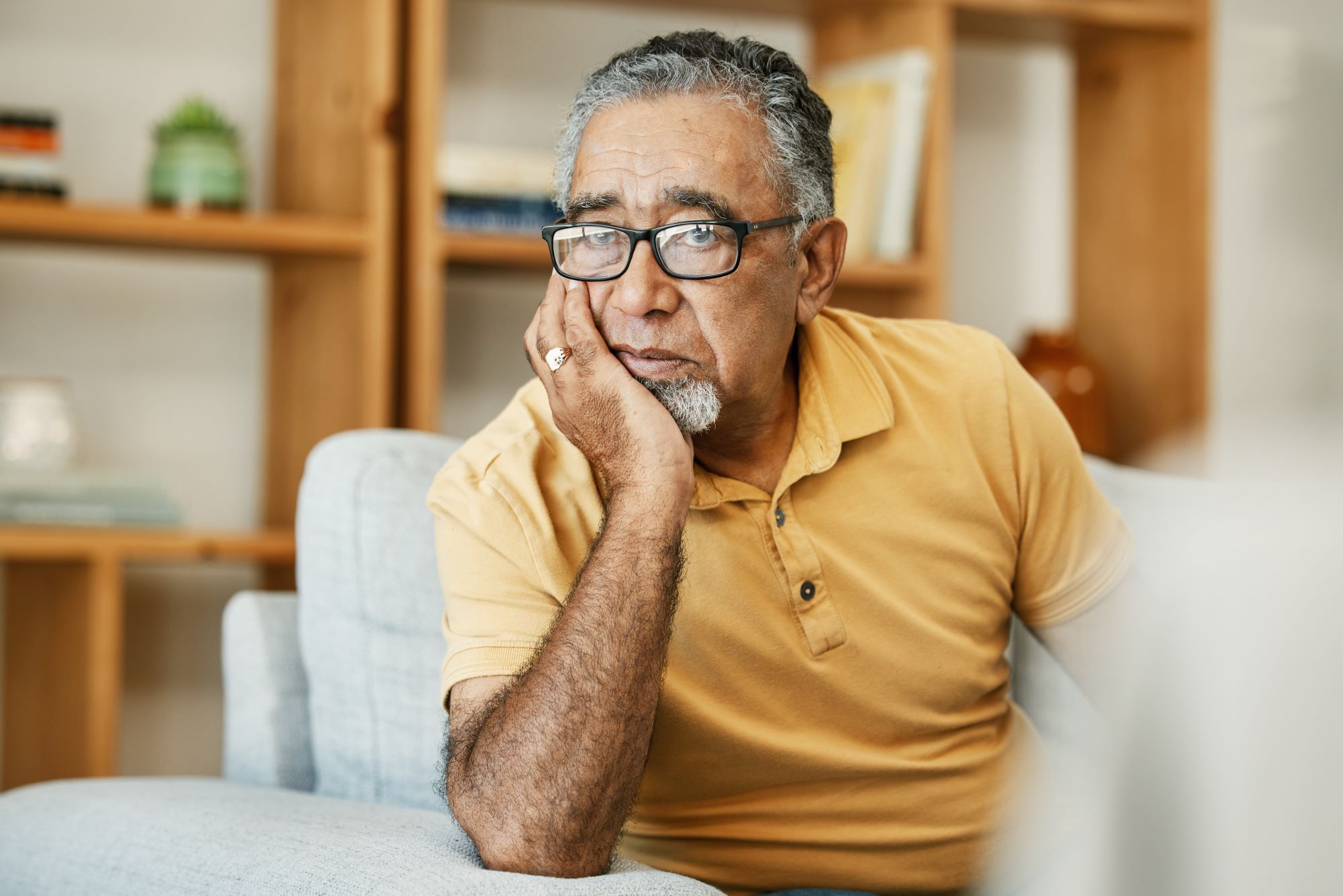 Elderly man feeling stressed