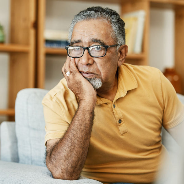 Elderly man feeling stressed