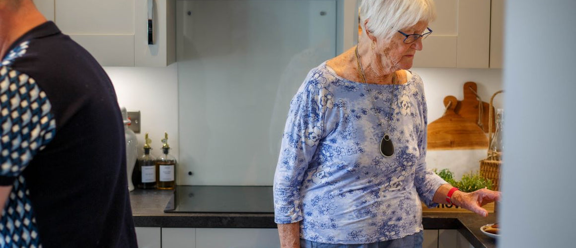 Elderly woman with her personal alarm keyring