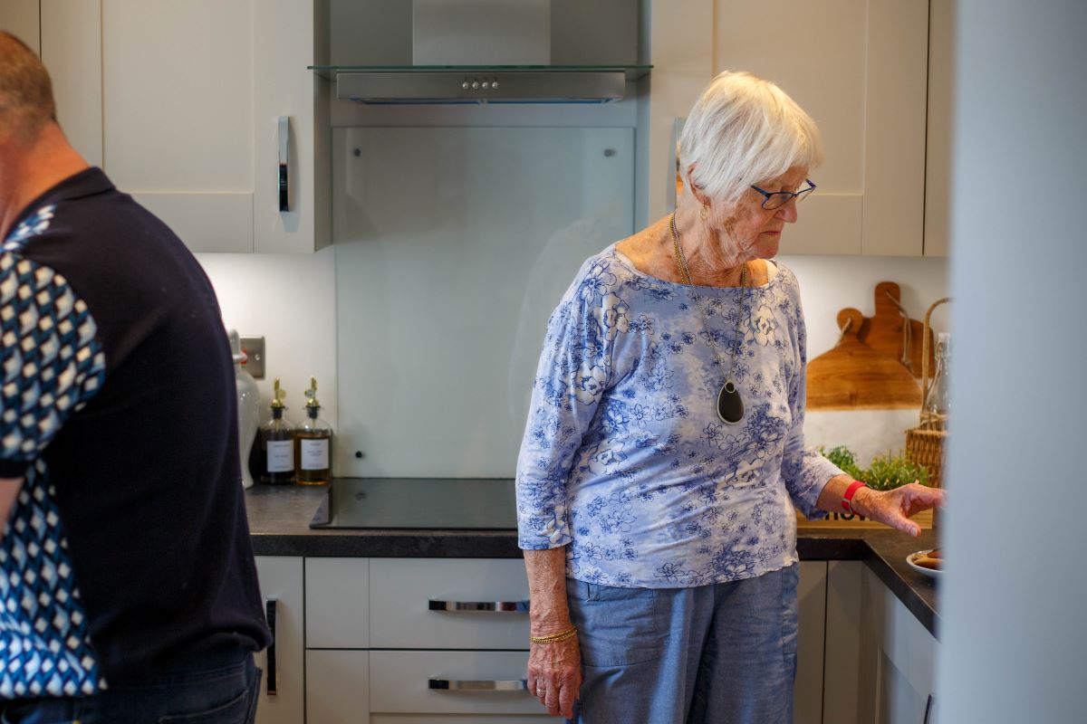 Elderly woman with her personal alarm keyring