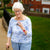 An elderly woman with her GPS enabled careline alarm
