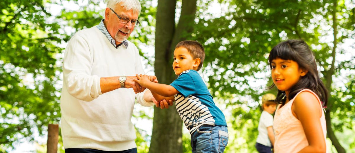 elderly grandfather with grandkids