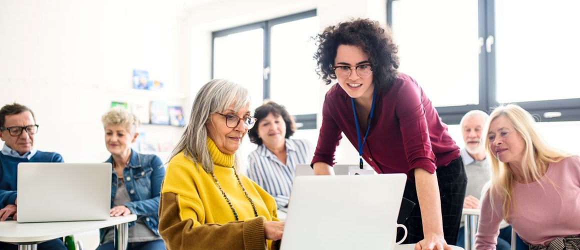 Elderly learning in a classroom