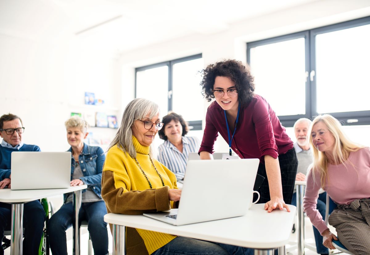 Elderly learning in a classroom