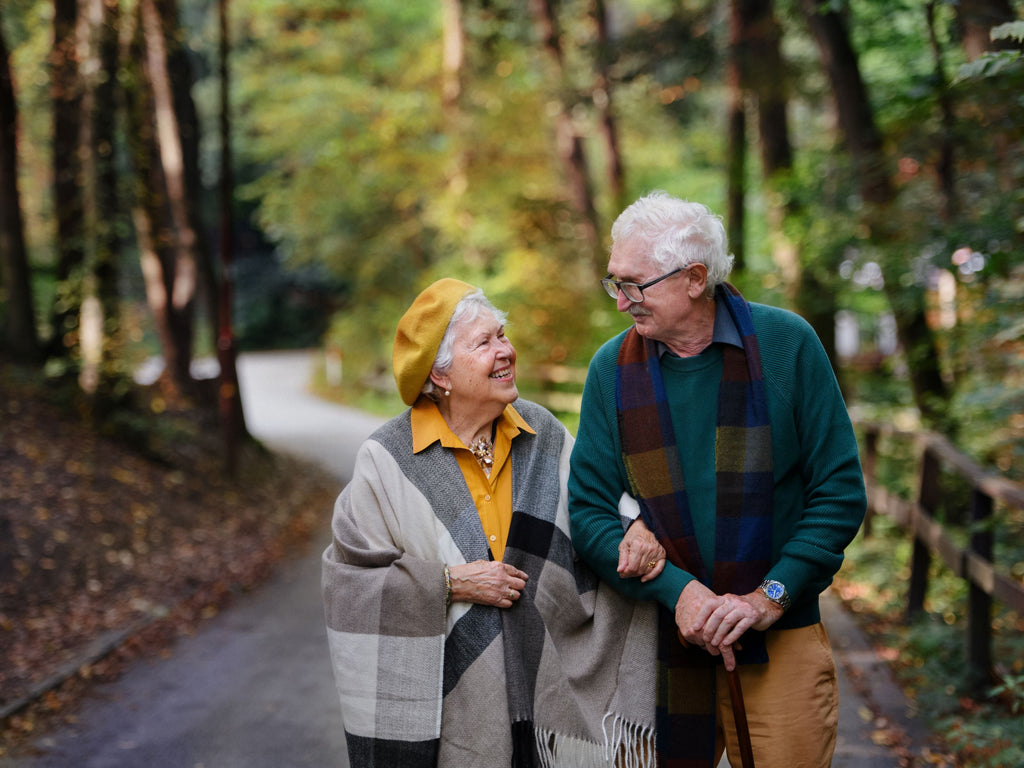 Older couple on a walk in warm clothes