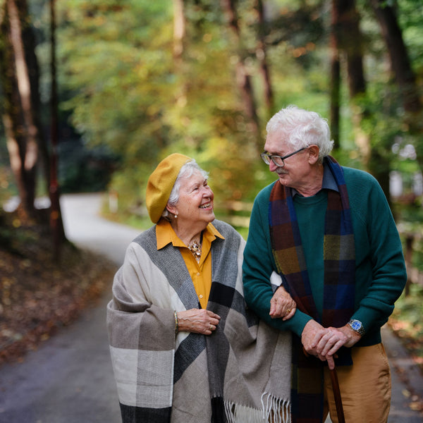 Older couple on a walk in warm clothes
