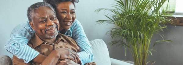 Elderly man with adult daughter carer