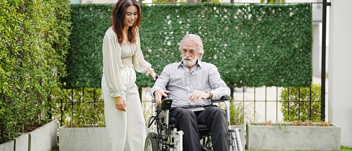 Elderly man in wheelchair