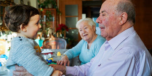 Elderly man with granddaughter