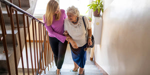 Elderly mother and daughter at home