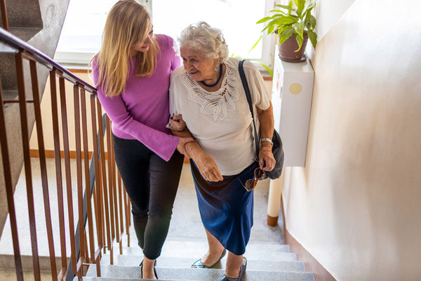 Elderly mother and daughter at home