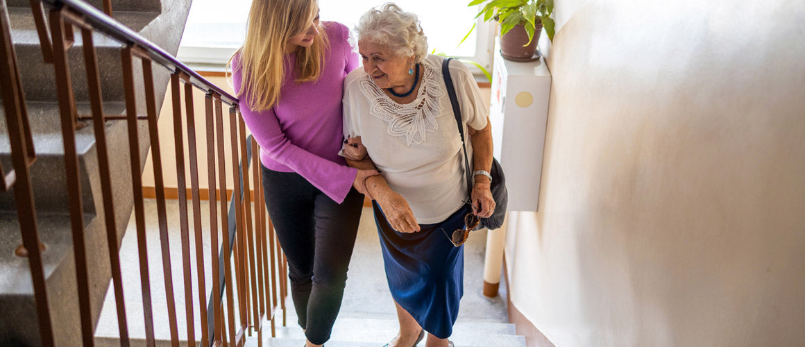 Elderly mother and daughter at home