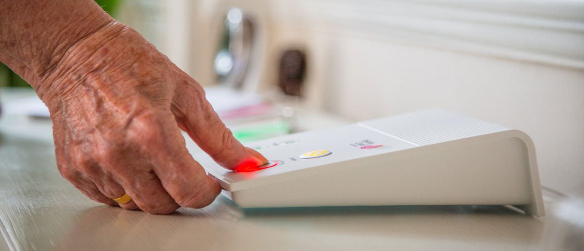 Personal alarm base unit plugged in