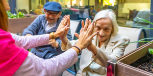 Elderly woman feeling happy with her social group