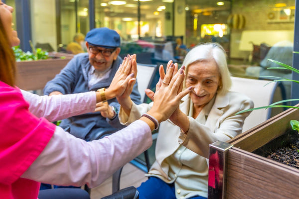 Elderly woman feeling happy with her social group