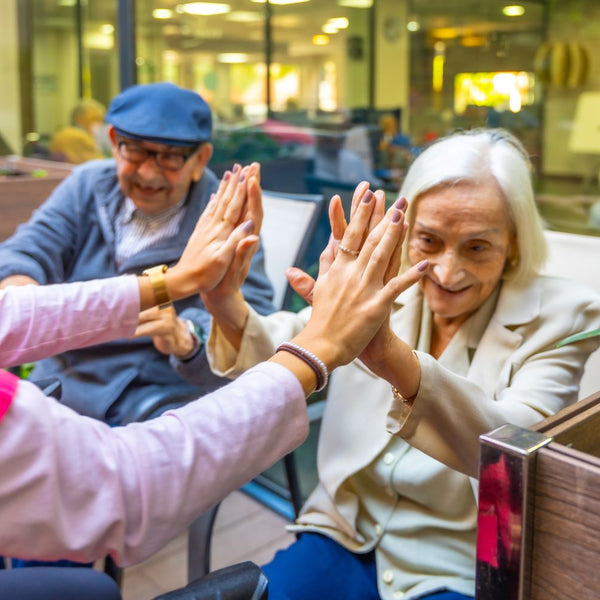 Elderly woman feeling happy with her social group