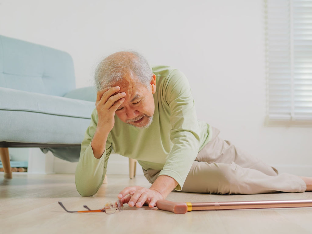 Elderly man having a fall