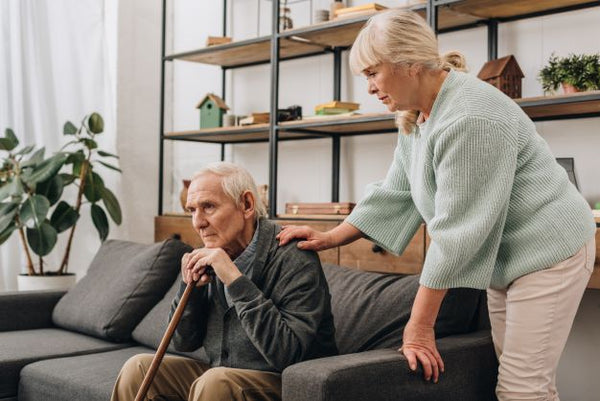 Wife consoling husband with Dementia