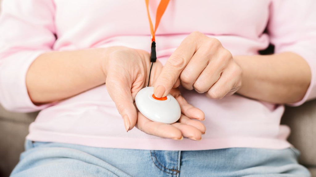 Women pressing her waterproof personal alarm
