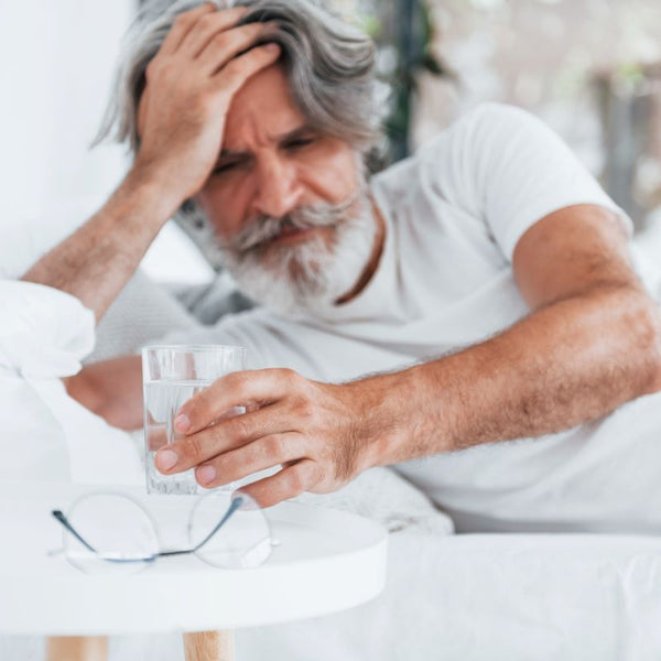 Elderly man feeling dizzy