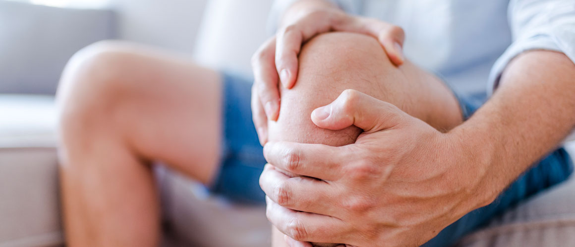 Elderly person with bruised knee