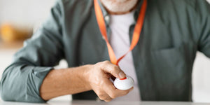 Elderly man with Wi-Fi personal alarm