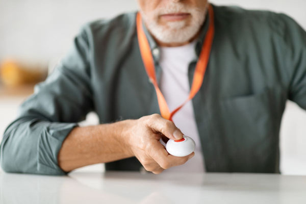 Elderly man with Wi-Fi personal alarm