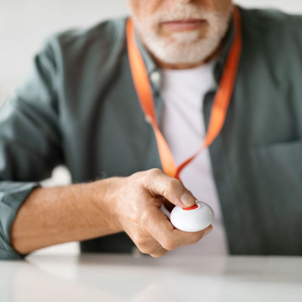 Elderly man with Wi-Fi personal alarm