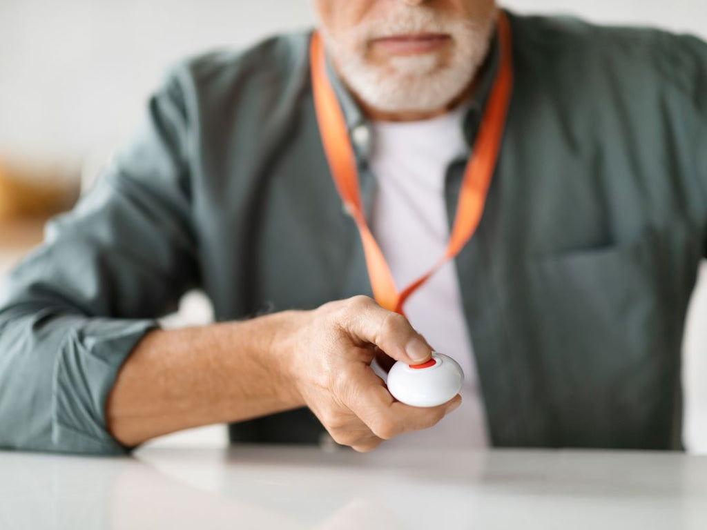 Elderly man with Wi-Fi personal alarm
