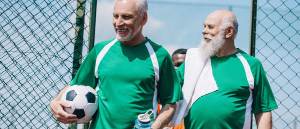 Elderly men playing walking football