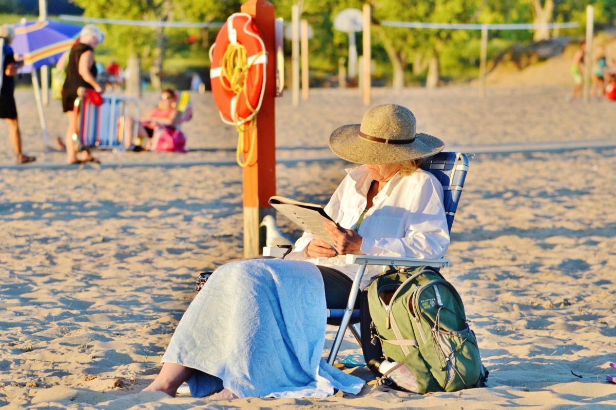 Elderly woman at the beach