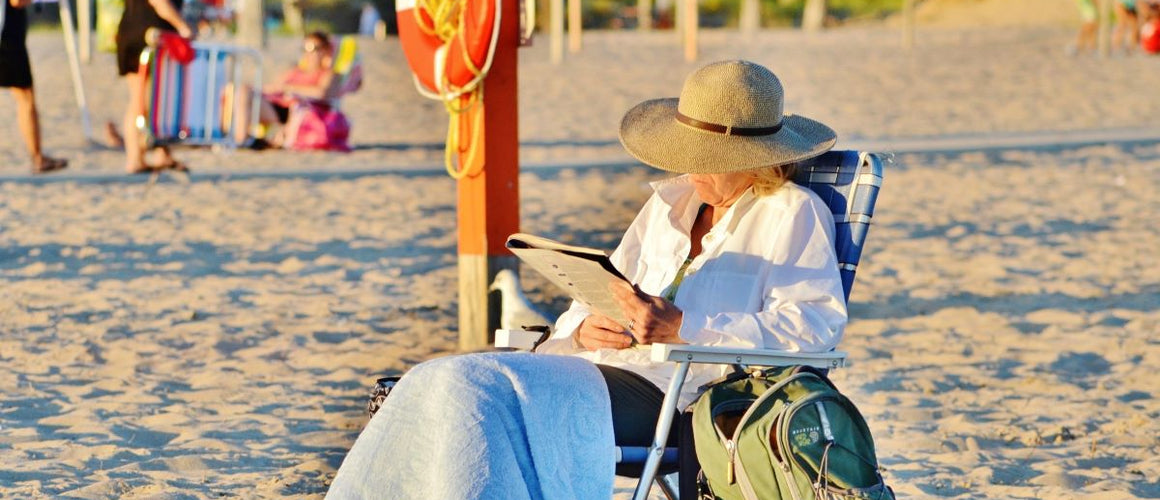 Elderly woman at the beach