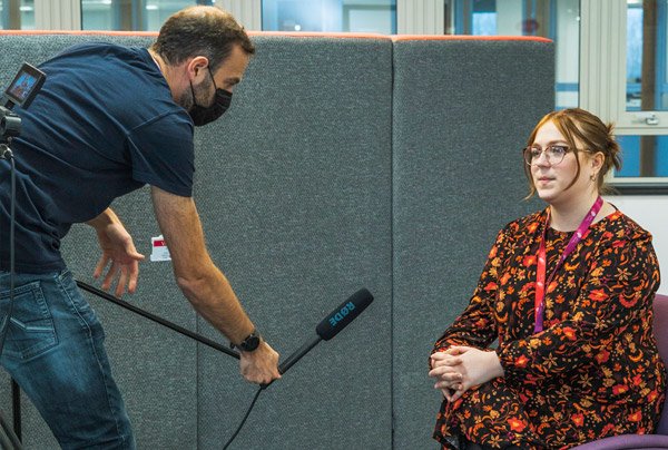 Taking Care staff expert being interviewed